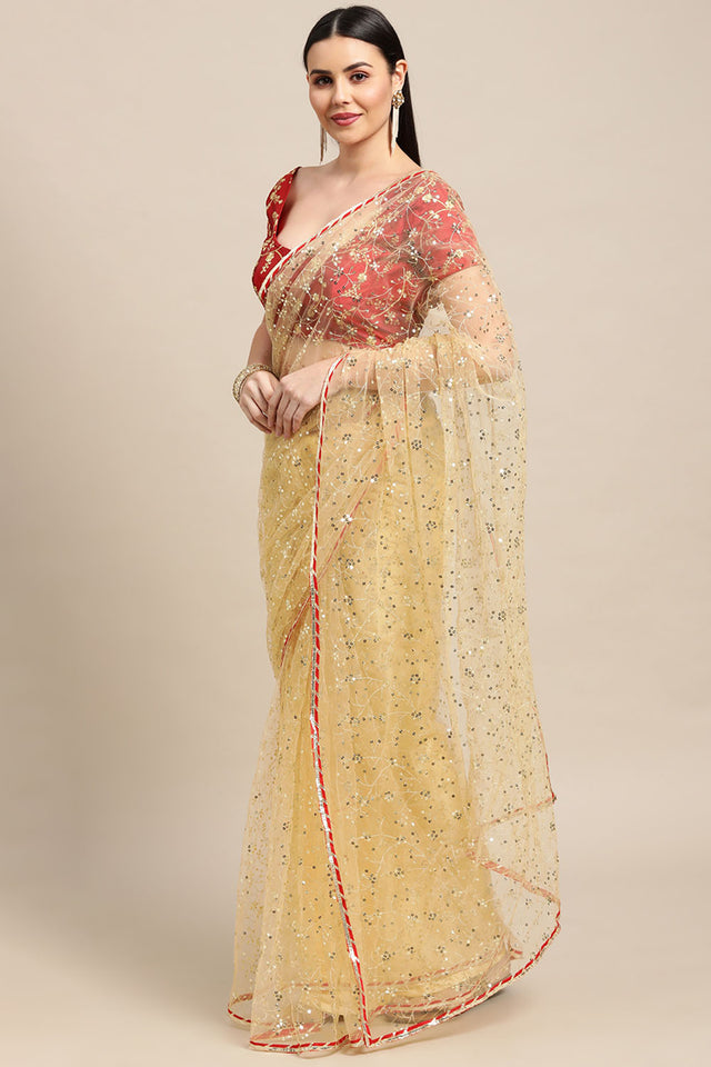Cream Embroidered Net Saree