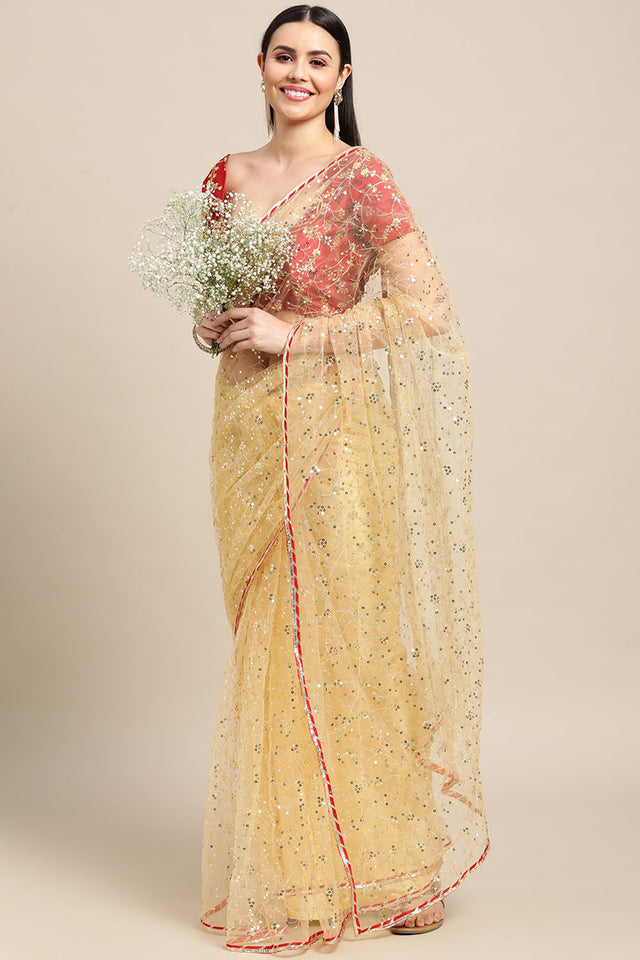 Cream Embroidered Net Saree