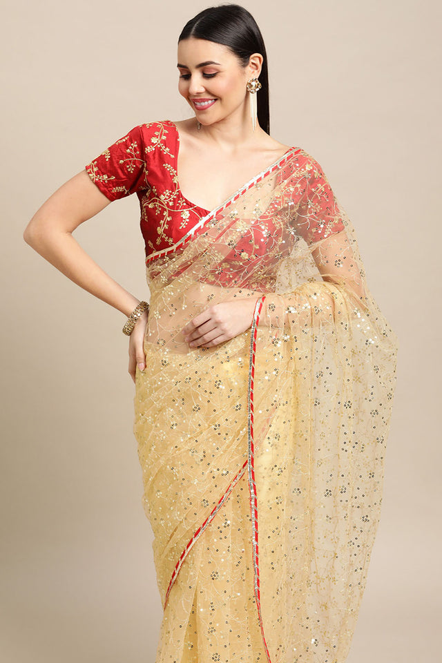 Cream Embroidered Net Saree