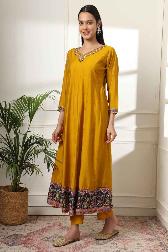 Yellow Solid Beads and Stones Embossed Silk Kurti Pant Set