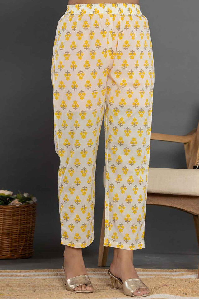 Yellow Ethnic Motifs Beads and Stones Embossed Pure Cotton Kurti Pant Set