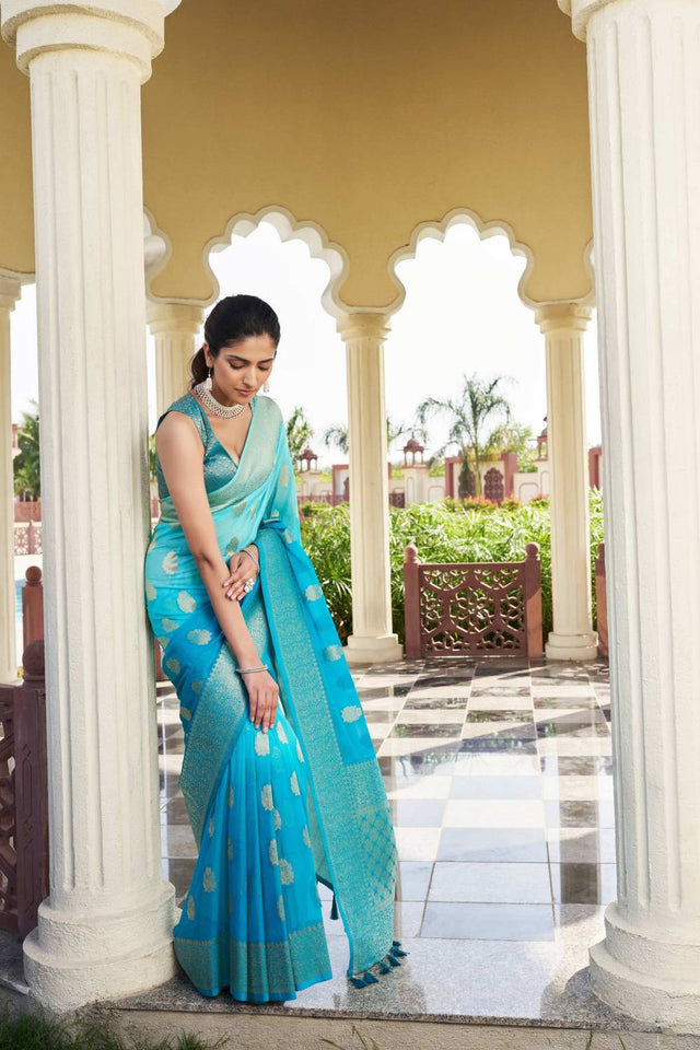 Turquoise Woven Georgette Saree
