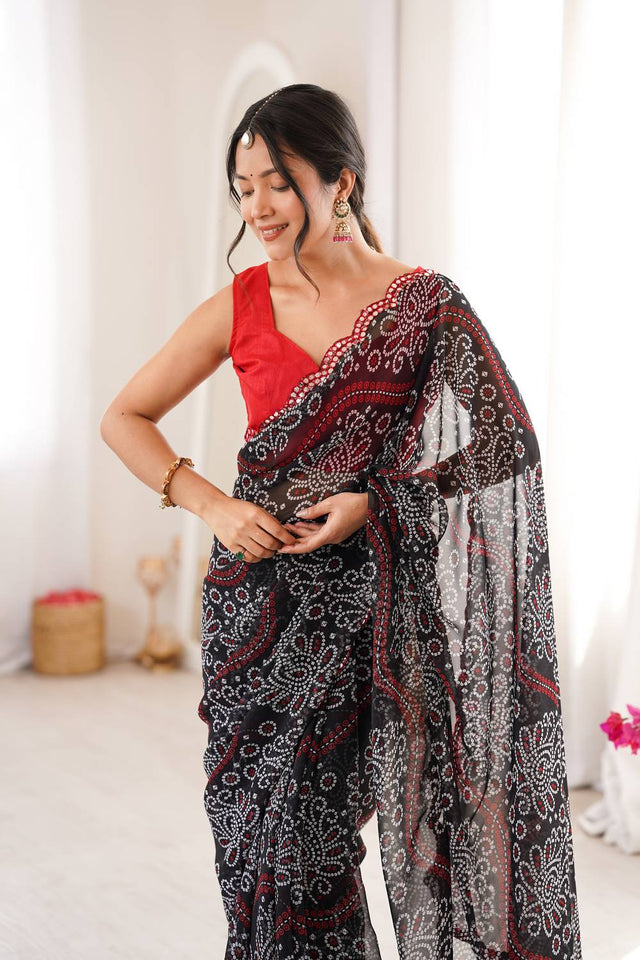 Black Bandhani Printed with Mirror Embroidered Border Georgette Saree (ACA6967)
