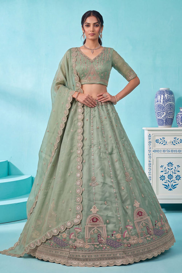Pista Heavy Embroidered Silk Lehenga (ACB2307)