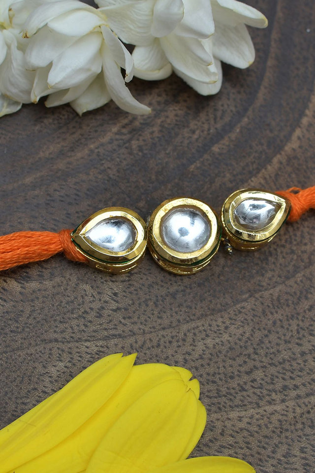 Orange Gold Tone Kundan Rakhi