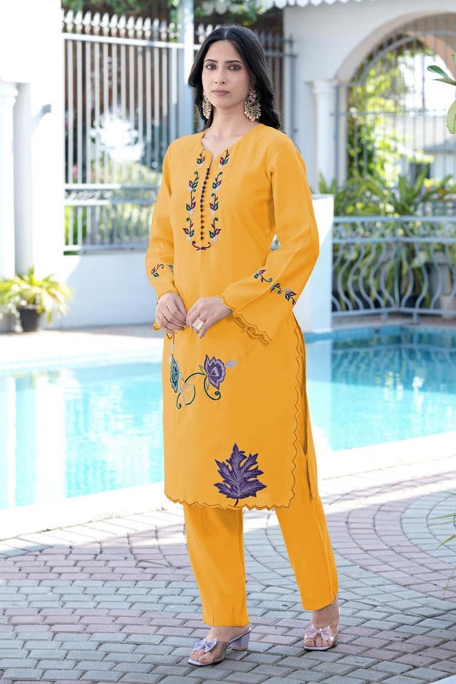 Yellow Floral Embroidered Art Silk Kurti Pant Set (NC2238EKS)