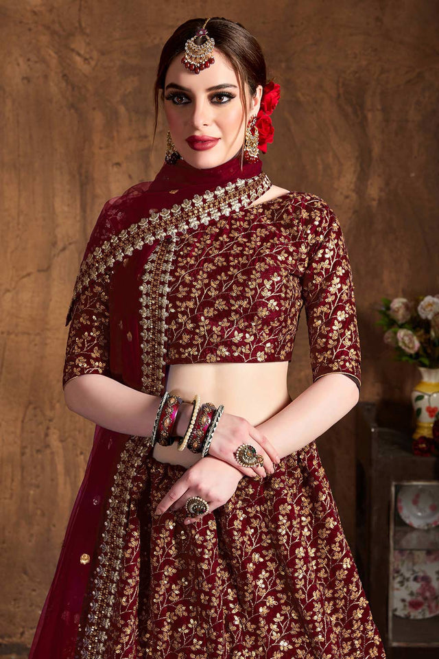 Maroon Raw Silk Zari And Sequins Heavy Embroidery Work Lehenga Set ('7406)