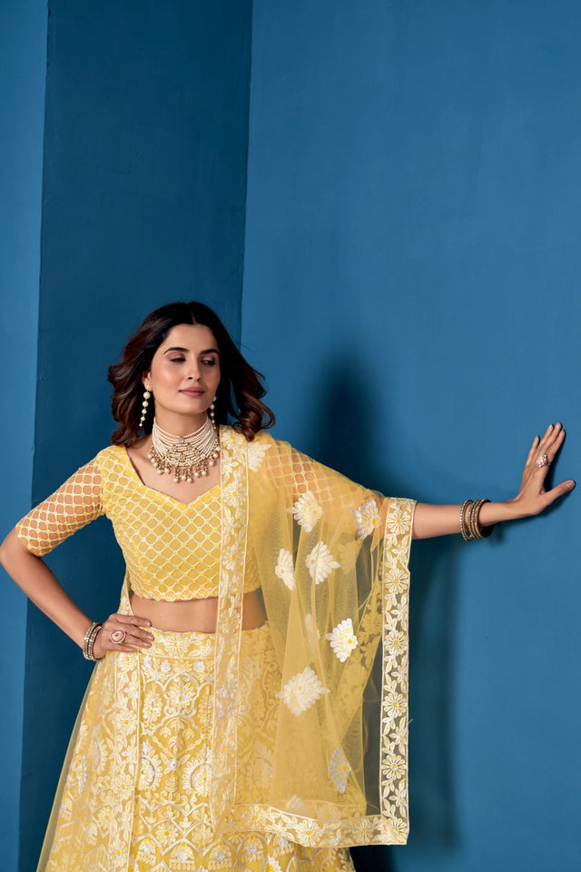 Yellow Net Embroidered Lehenga Choli With Dupatta