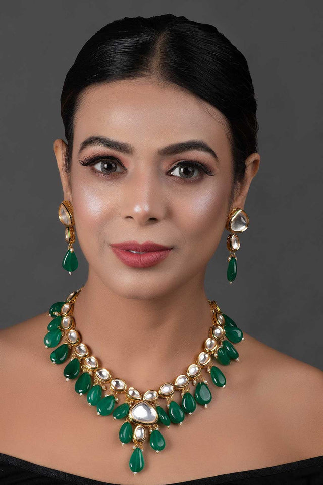 Emerald Beaded Gold Toned Kundan Inspired Necklace With Earrings (FEMNLC010)