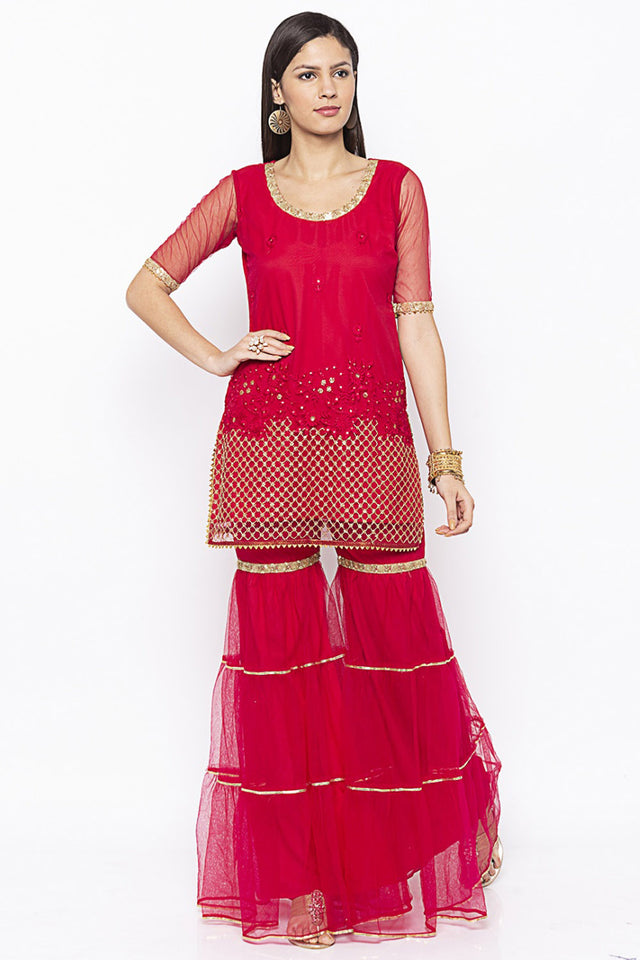 Net Short Kurti Top In Maroon