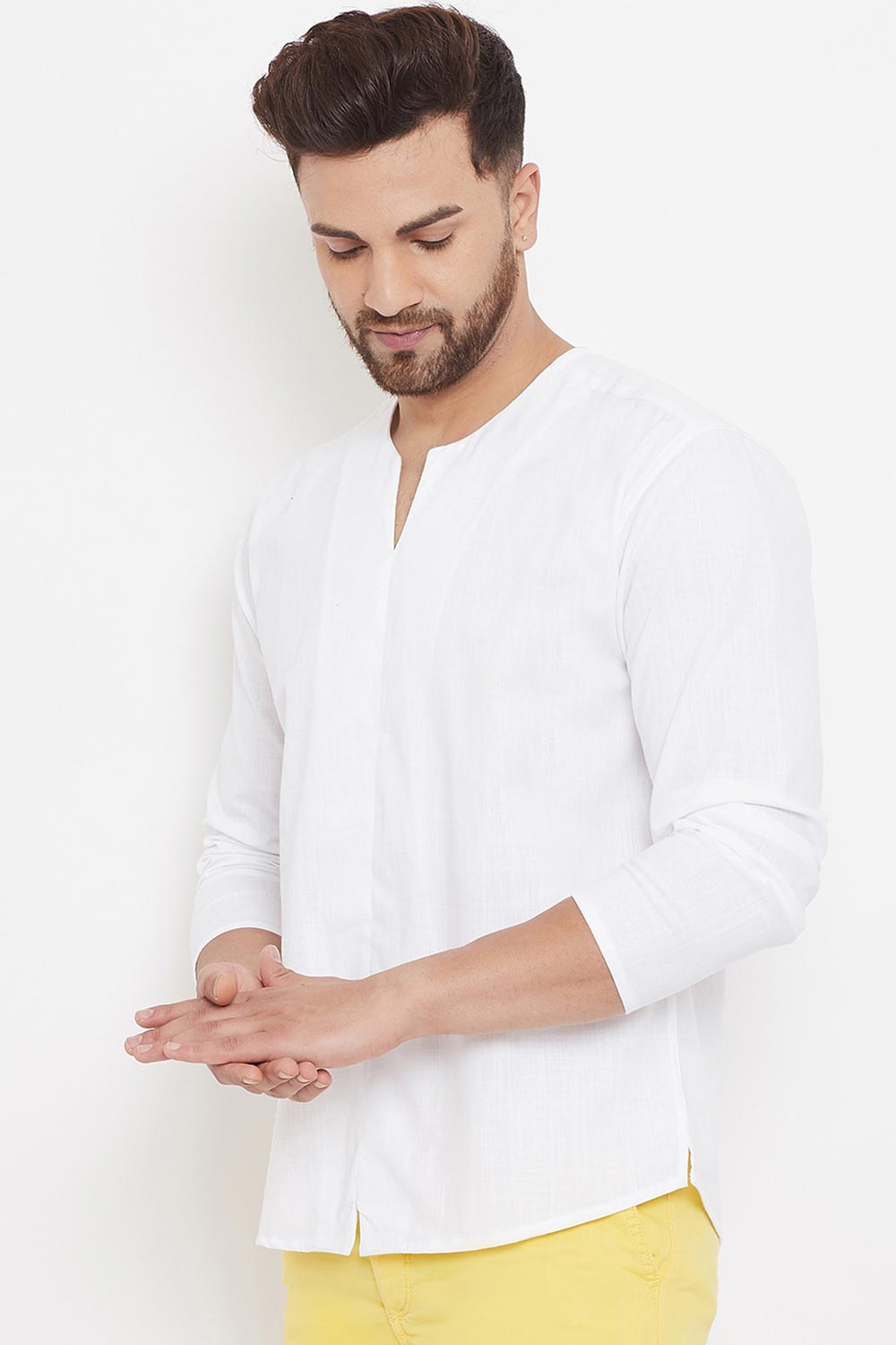 Buy Men's Blended Cotton Solid Short Kurta in White - Front