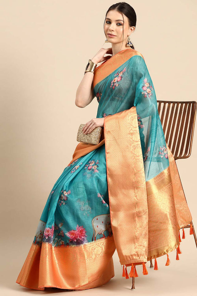 Teal Muga Silk Animal Print Saree
