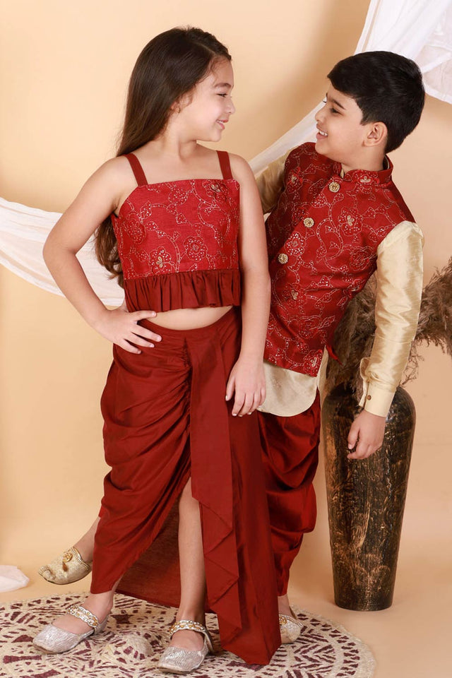 Boys Maroon And Gold Jacket, Kurta And Dhoti Set & Girls Maroon Lehenga Set