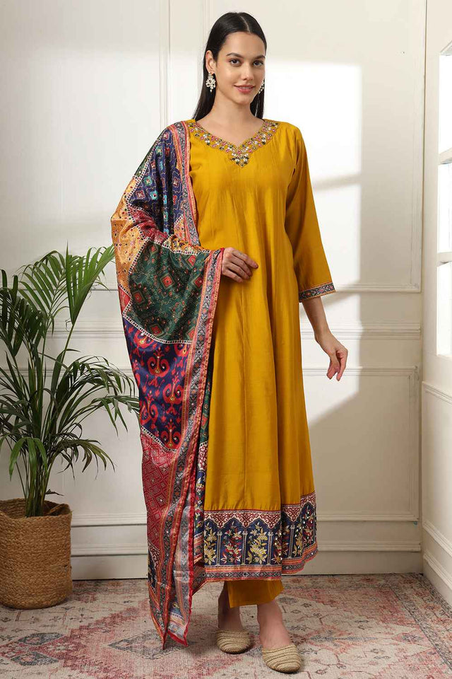 Yellow Solid Beads and Stones Embossed Silk Kurti Pant Set