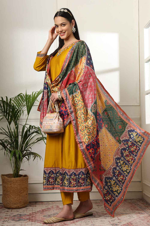 Yellow Solid Beads and Stones Embossed Silk Kurti Pant Set