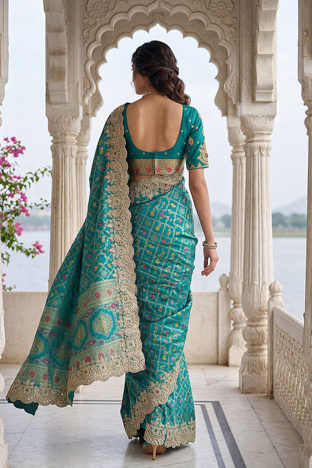 Turquoise Sequin & Stone Embellished Banarasi Silk Saree (ACA6929)
