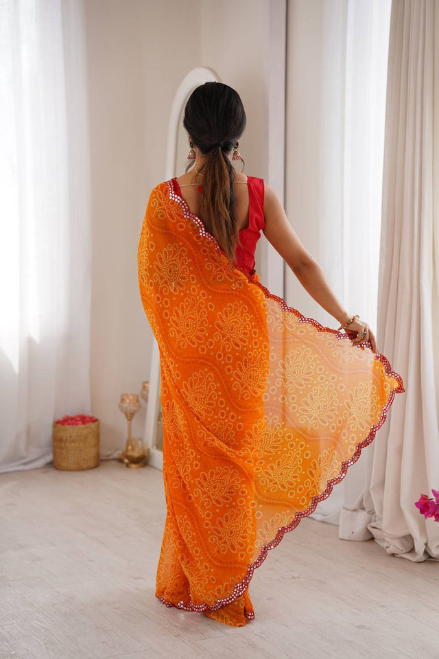Orange Bandhani Printed with Mirror Embroidered Border Georgette Saree (ACA6968)