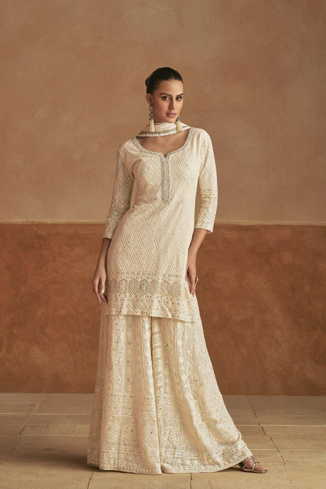 Off White Heavy Embroidered Georgette Free Size Stithced Palazzo Suit (ACA9199)
