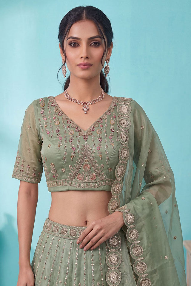 Pista Heavy Embroidered Silk Lehenga (ACB2307)