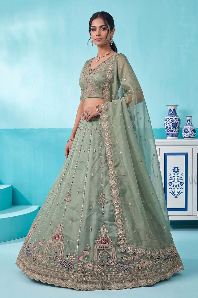 Pista Heavy Embroidered Silk Lehenga (ACB2307)