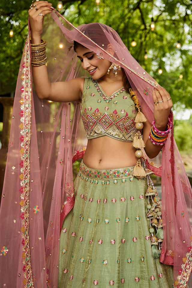 Green Heavy Embroidered Tissue Lehenga (ACZ8934)