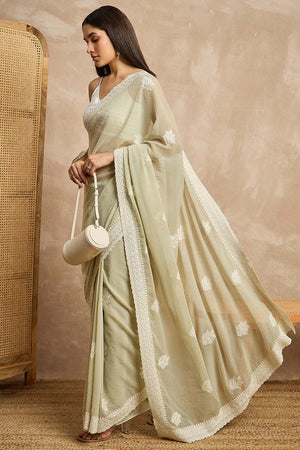 Green Pure Georgette Woven Saree