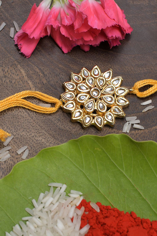 Yellow Gold Tone Floral Kundan Rakhi