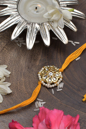 Kundan Floral Red Gold Tone Kundan Rakhi