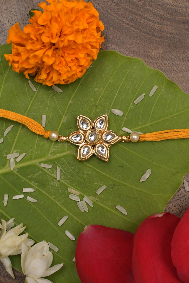 Yellow Gold Tone Floral Kundan Rakhi