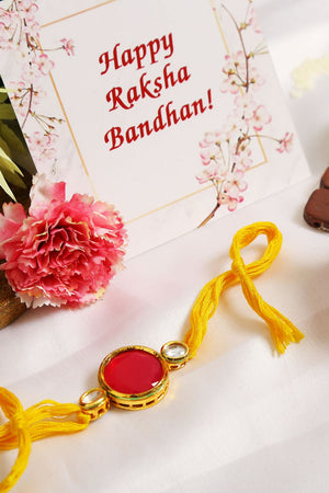 Red Gold Tone Kundan Rakhi With Yellow Thread