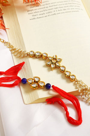 Gold-Toned Kundan Embellished Rakhi & Floral Lumba Set-Set Of 2