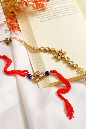 Gold-Toned Kundan Embellished Rakhi & Floral Lumba Set-Set Of 2