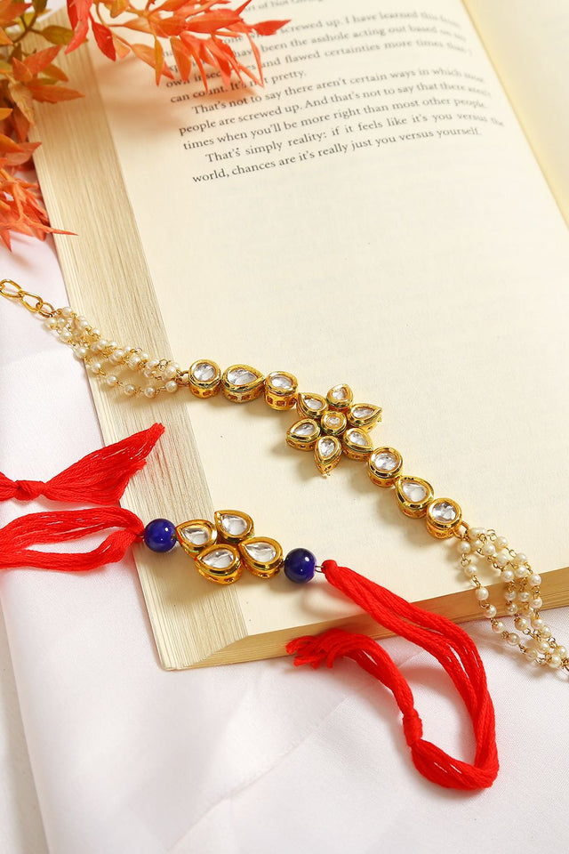Gold-Toned Kundan Embellished Rakhi & Floral Lumba Set-Set Of 2
