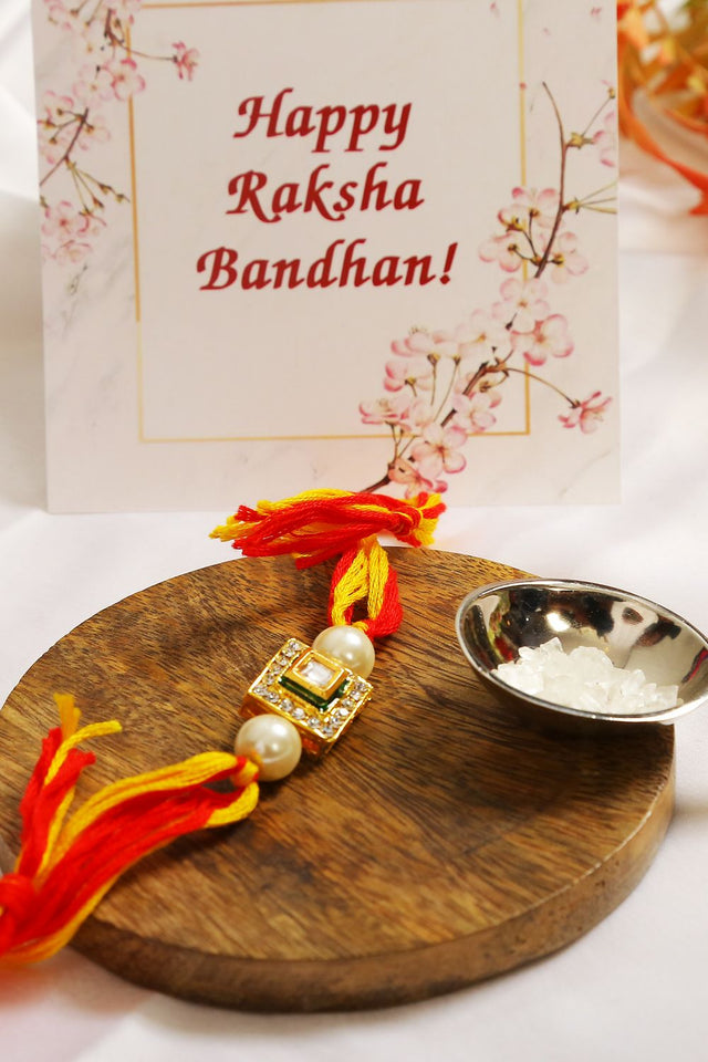 High Quality Kundan Studded Rakhi With Yellow Cotton Thread