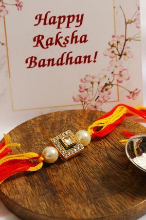 High Quality Kundan Studded Rakhi With Yellow Cotton Thread