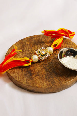 High Quality Kundan Studded Rakhi With Yellow Cotton Thread