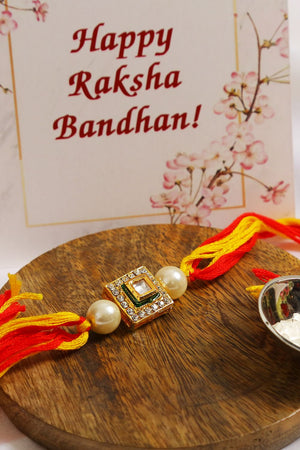 High Quality Kundan Studded Rakhi With Yellow Cotton Thread