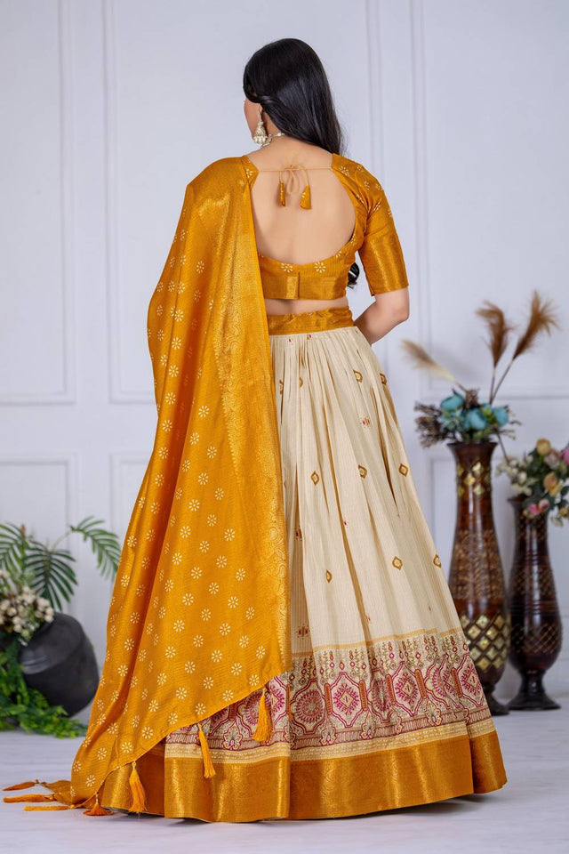Yellow Floral Embroidered Lichi Fabric With Jacquard Border Lehenga