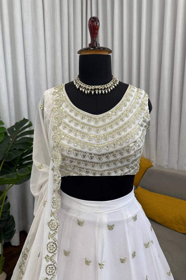 Off White Floral Embroidered Georgette Lehenga (QRC-399.)