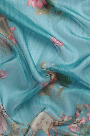 Turquoise Animal Printed Silk Saree