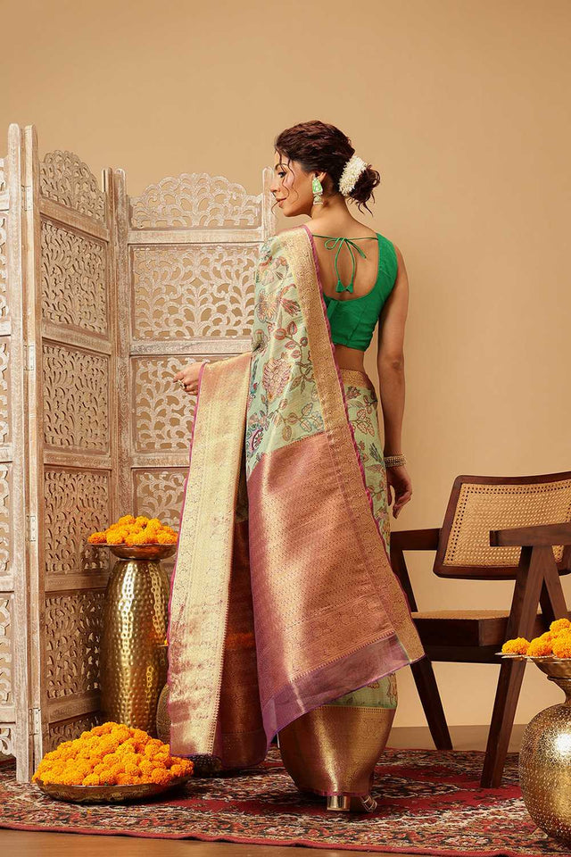 Green Animal Printed Muga Silk Saree