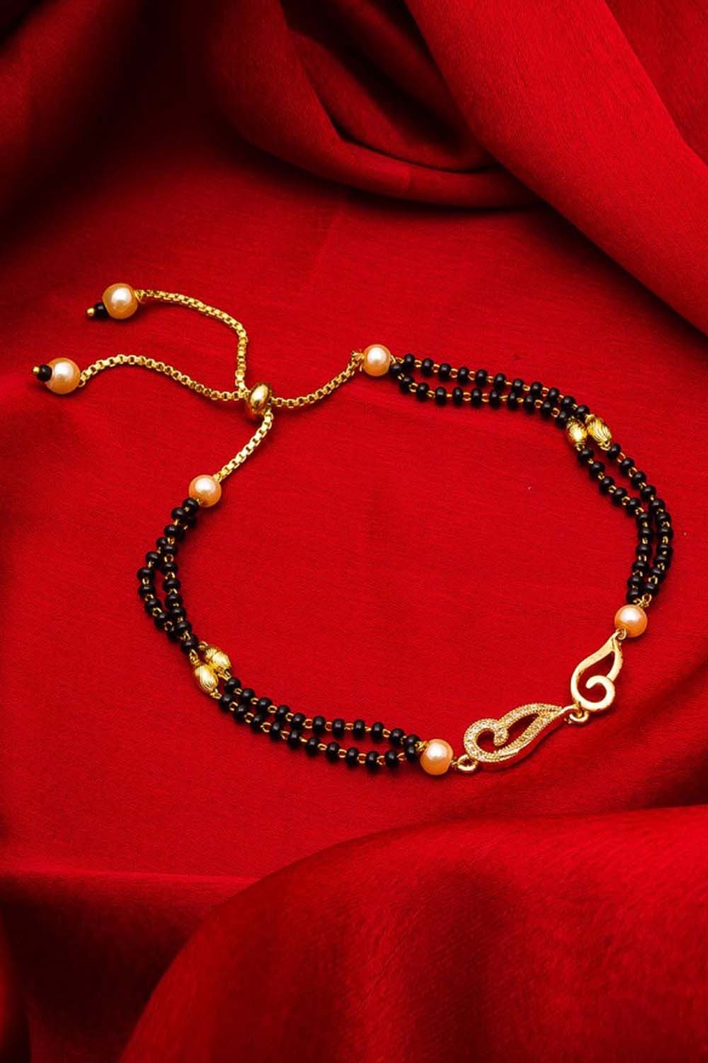 Buy Women's Alloy Bracelet in Gold and Black Online 
