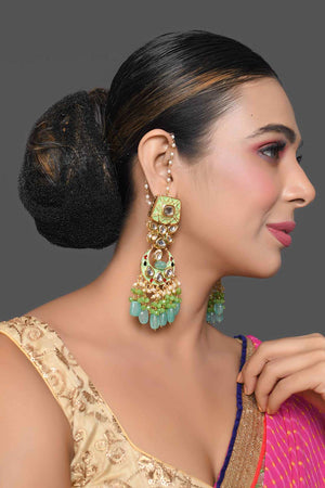 Gold Toned Green Kundan Studded & Enameled Handcrafted Earrings (FEMBD021)