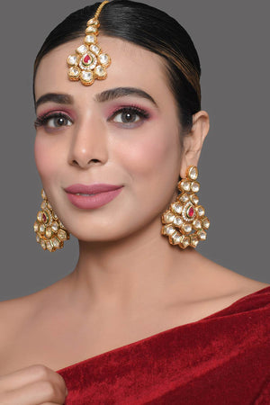 Handcrafted Kundan Studded Gold Toned Earring And Mang Tikka Set