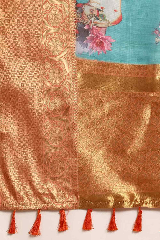 Teal Muga Silk Animal Print Saree