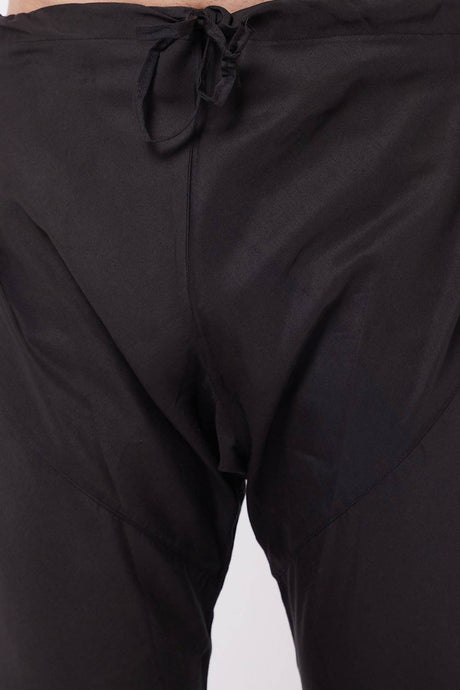 Buy Men's blended Cotton Solid Churidar in Black - Side