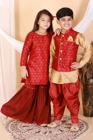 Boys Maroon And Gold Silk Blend Jacket, Kurta And Dhoti Set & Girls Jacquard Kurta With Sharara Set